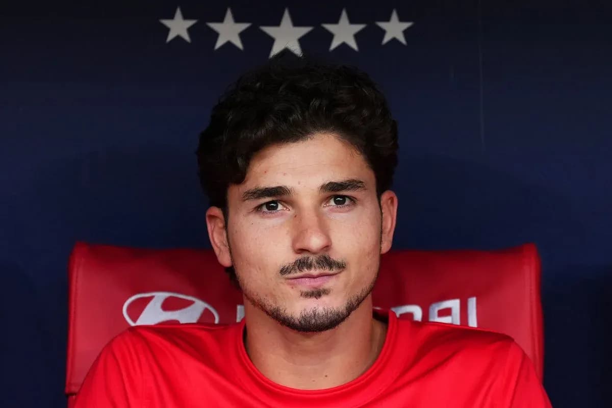 Jugador sentado en el banco de suplentes