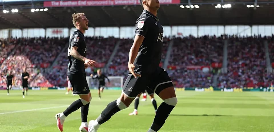 Jugador de Swansea celebrando un gol en el campo