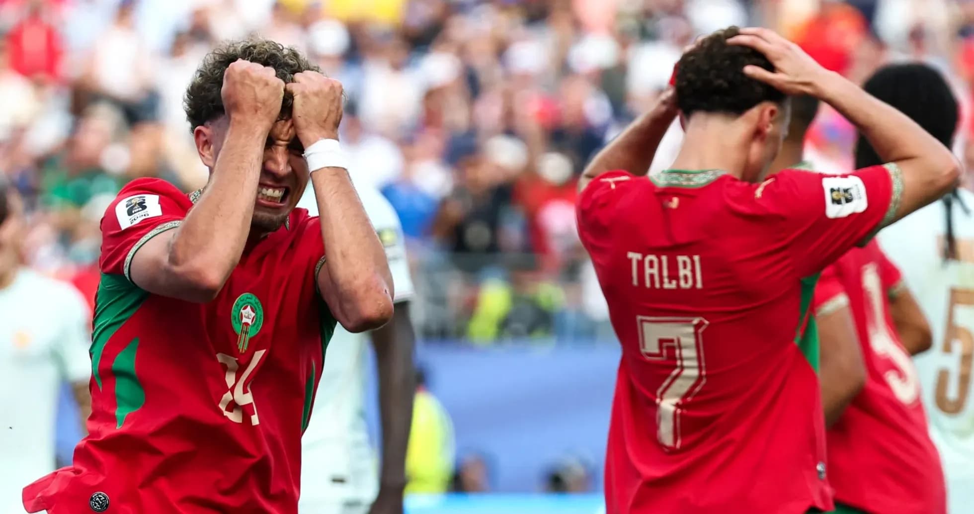Jugadores de Marruecos lamentando una jugada fallida
