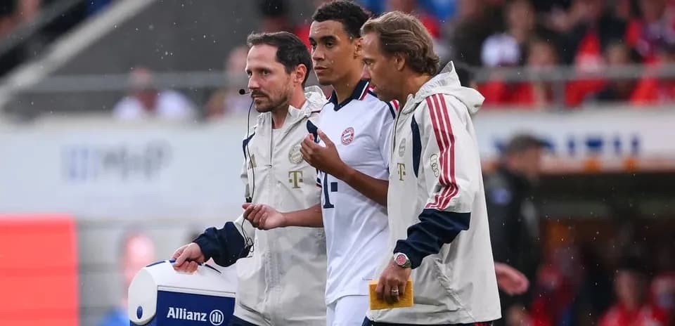 Jugador siendo asistido por el personal médico