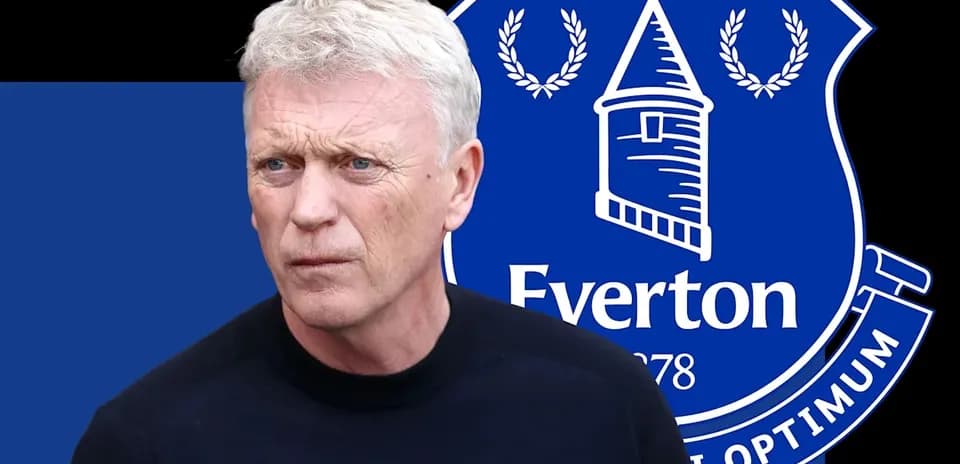 Entrenador con fondo del escudo de Everton