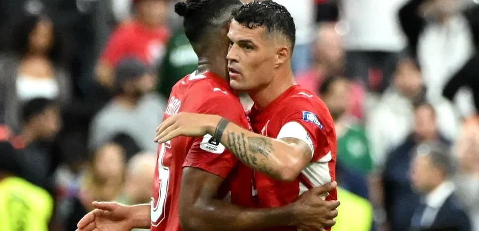 Jugadores suizos celebrando durante el partido