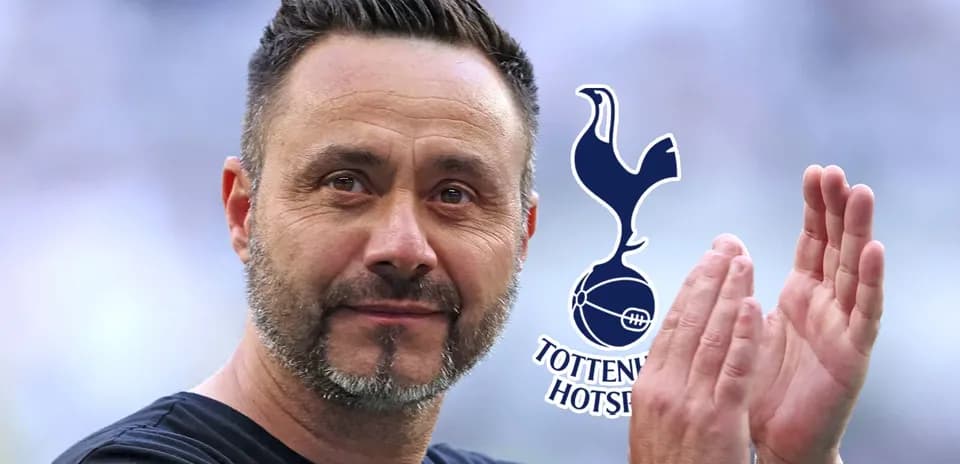 Entrenador aplaudiendo con el logo de Tottenham