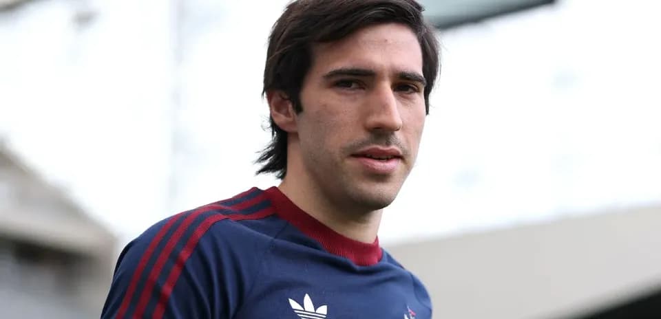 Jugador en uniforme de entrenamiento en el estadio