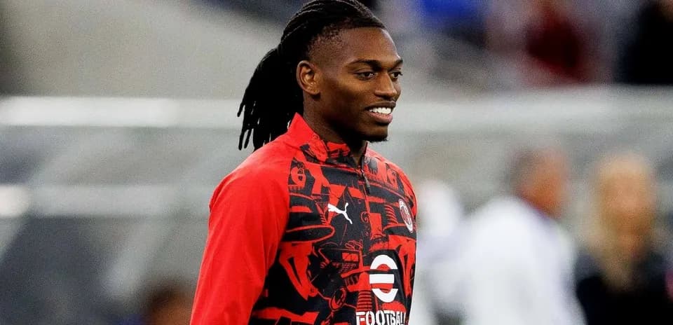 Jugador sonriendo en la sesión de calentamiento