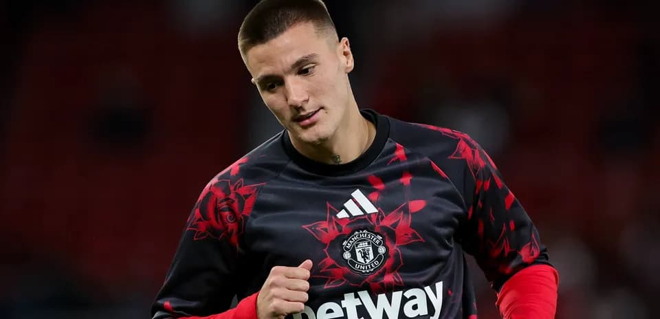 Jugador de Manchester United en calentamiento previo al partido