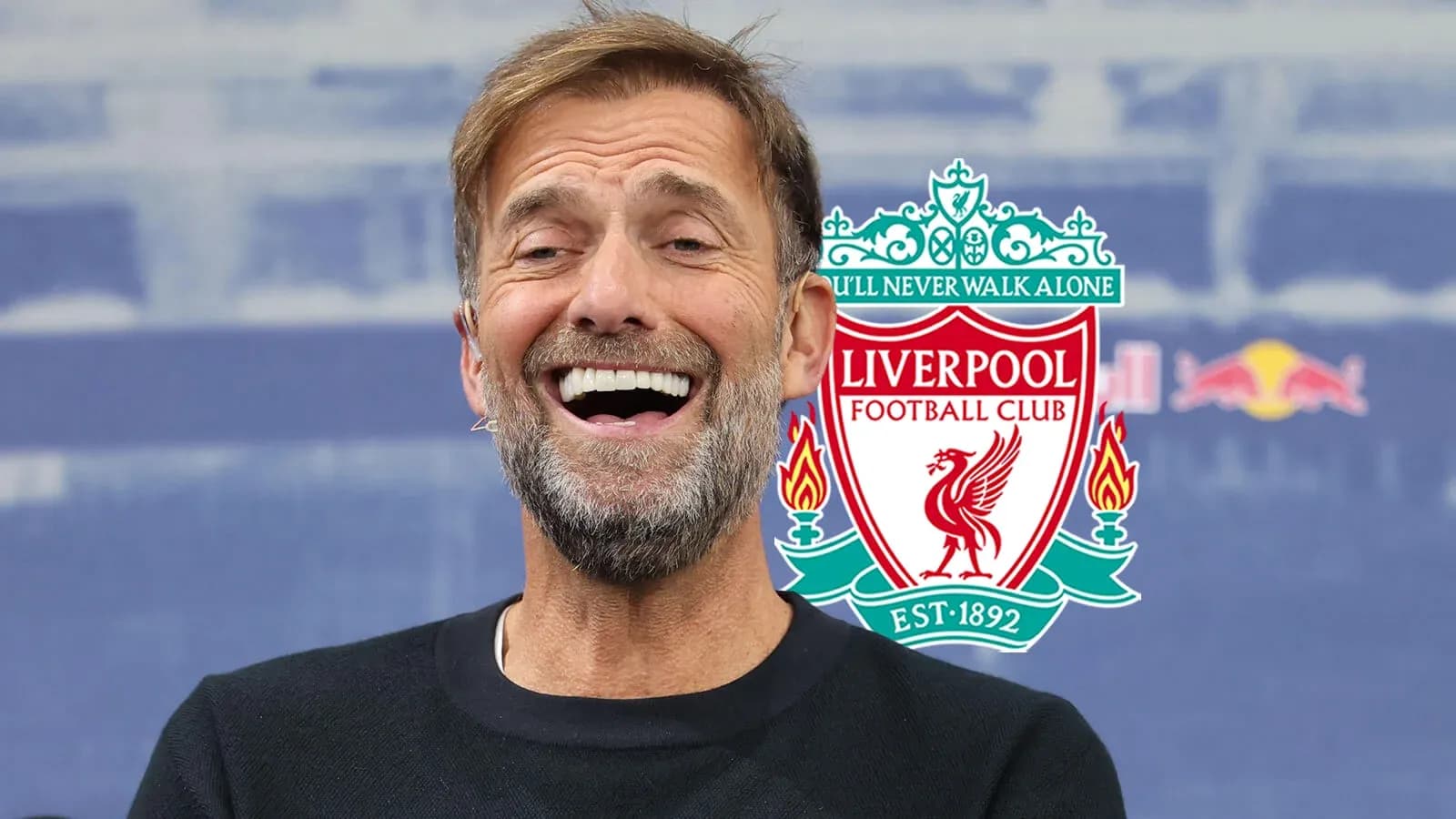 Entrenador de Liverpool sonriendo en conferencia de prensa