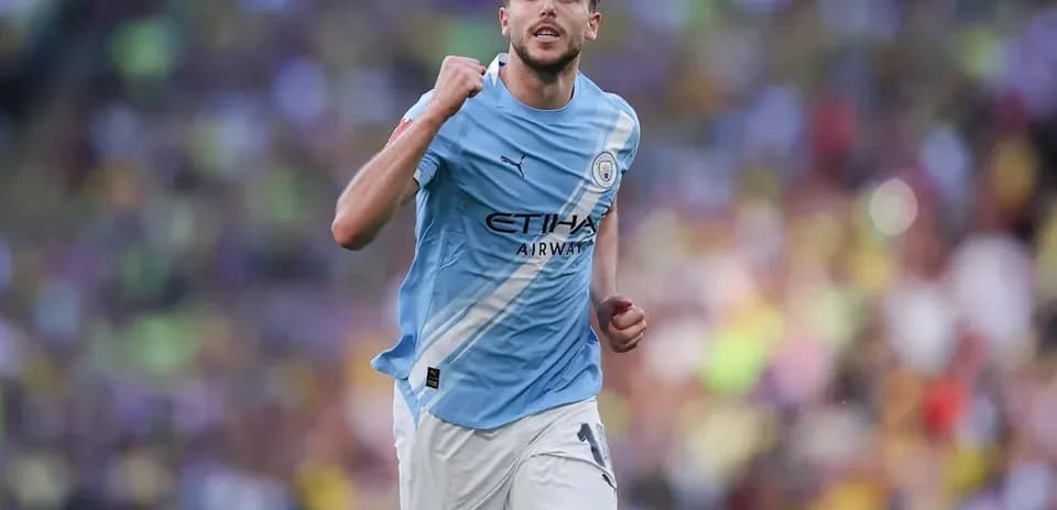 Jugador de Manchester City celebrando en el campo
