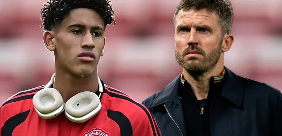 Jugador de Manchester United junto a su entrenador