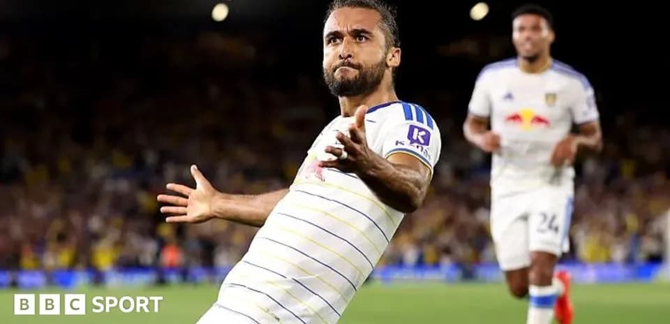 Jugador celebrando un gol en un partido de fútbol