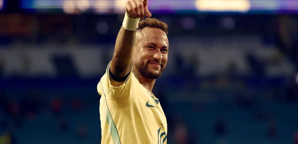 Jugador celebrando con el dedo señalando hacia arriba