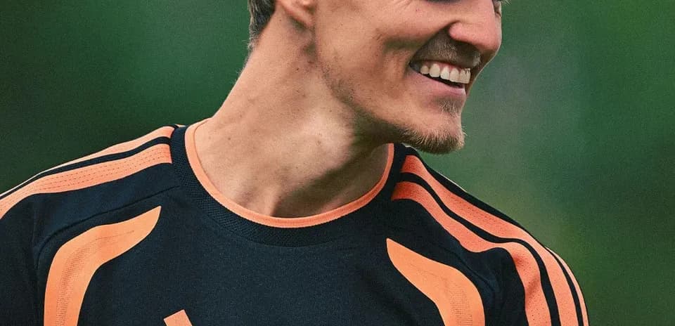 Jugador sonriendo durante sesión de entrenamiento