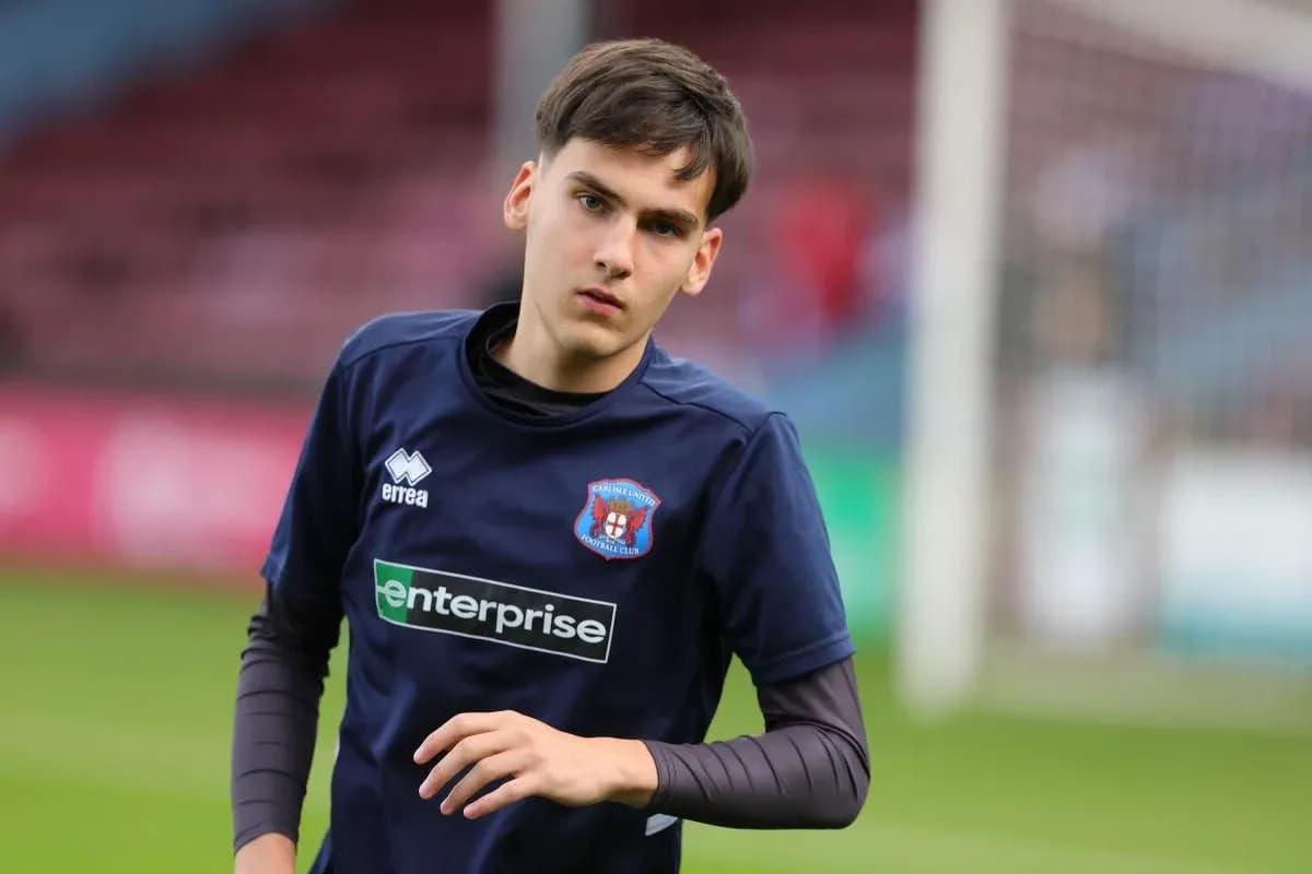 Jugador de Carlisle United en calentamiento previo al partido