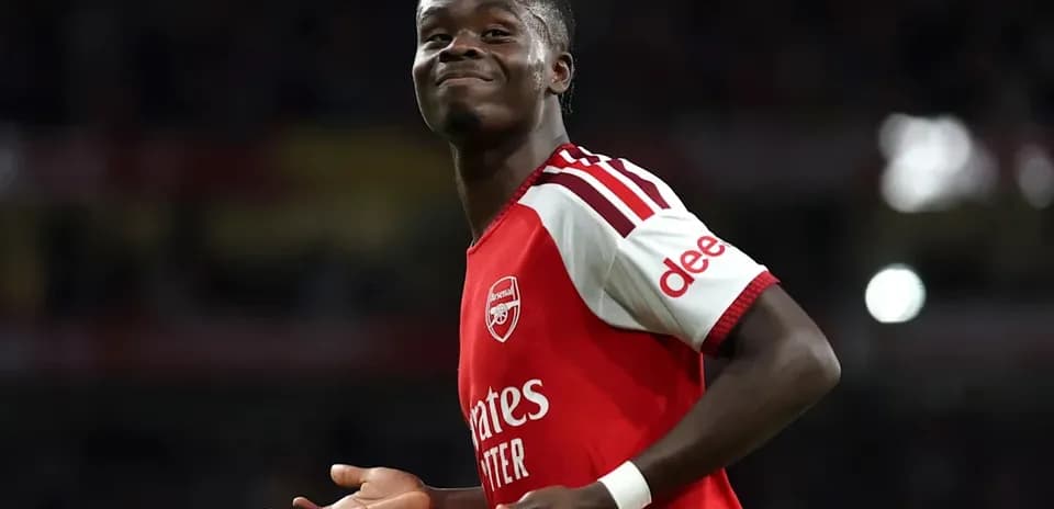 Jugador de Arsenal sonriendo durante un partido