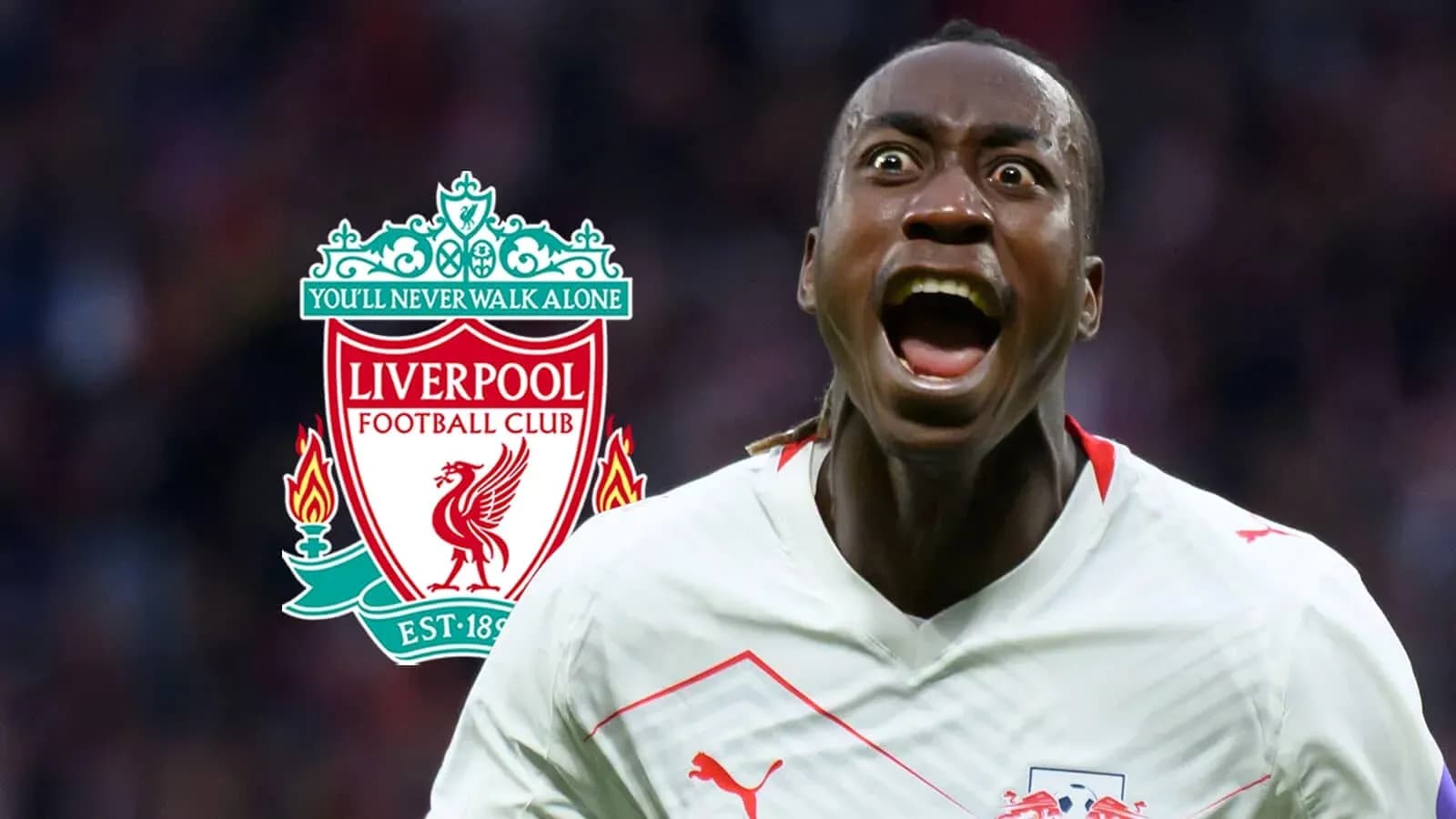 Jugador celebrando con el logo de Liverpool de fondo