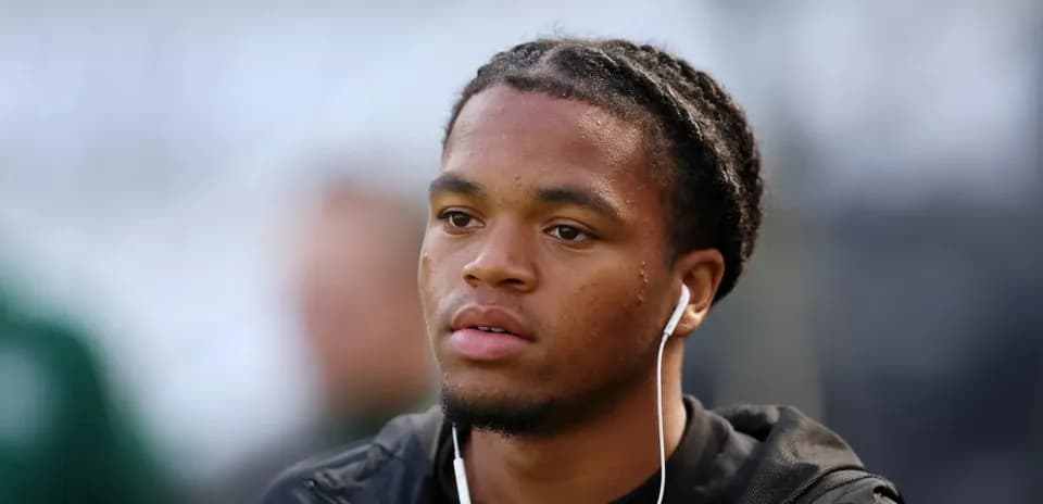 Jugador con auriculares antes del partido