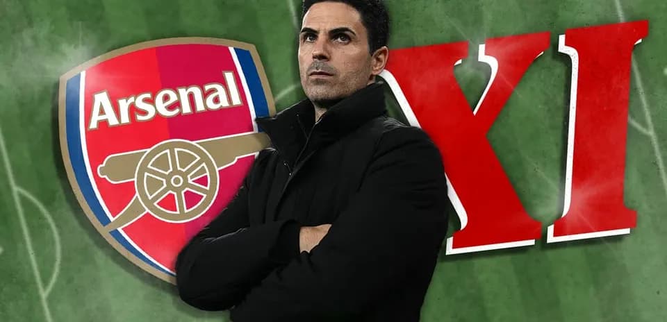 Entrenador de Arsenal frente al logo del club