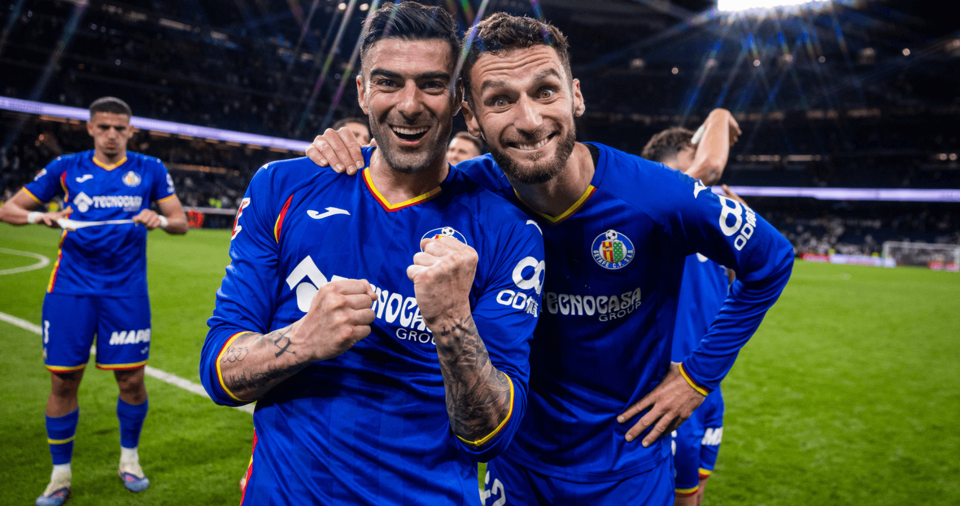 Jugadores de Getafe celebrando en el campo