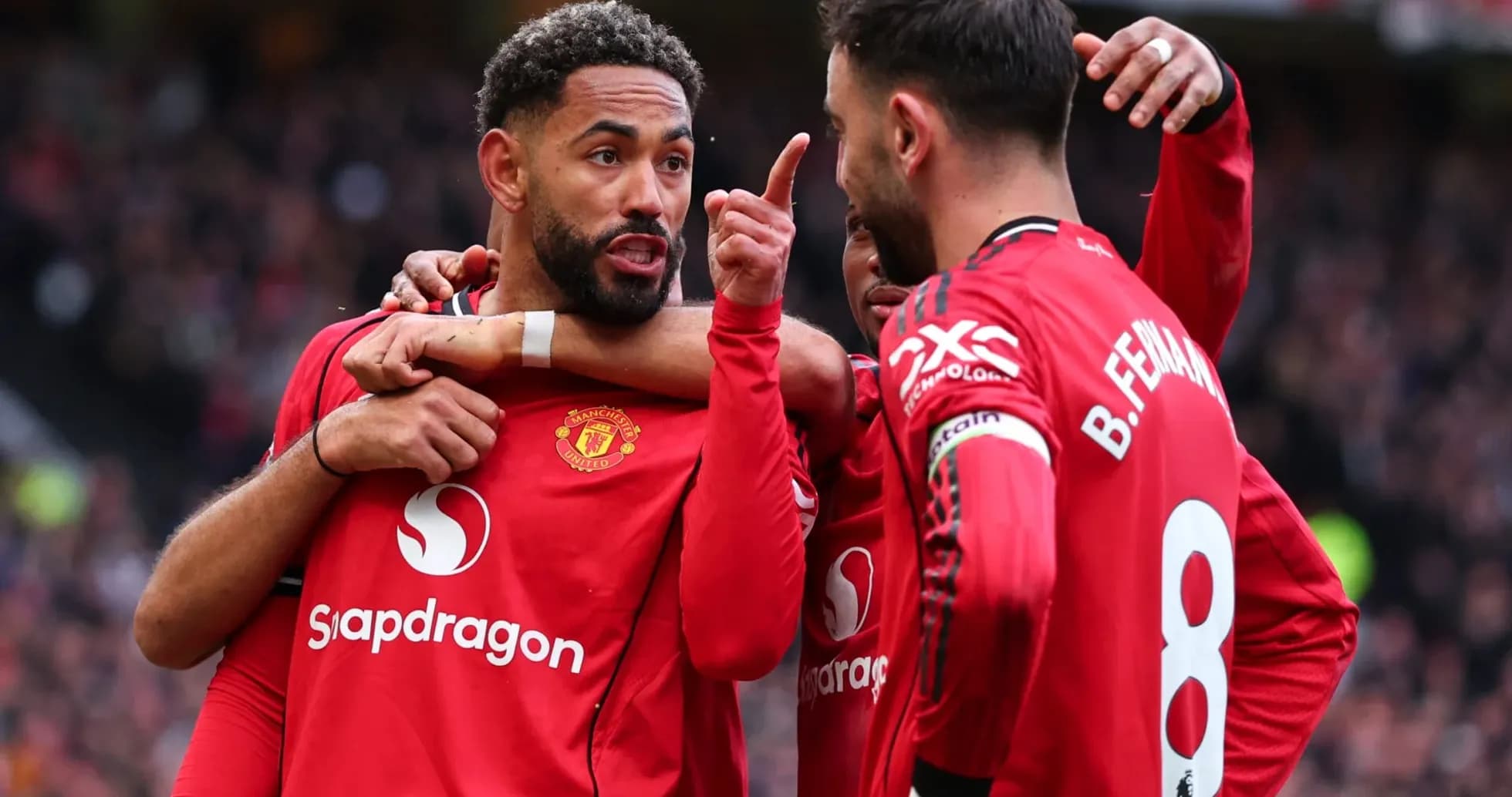 Jugadores de Manchester United celebrando un gol Jugadores de Manchester United celebrando un gol