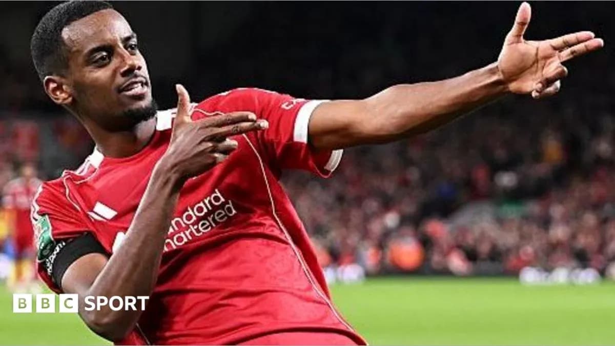 Jugador de Liverpool celebrando un gol en el estadio Jugador de Liverpool celebrando un gol en el estadio