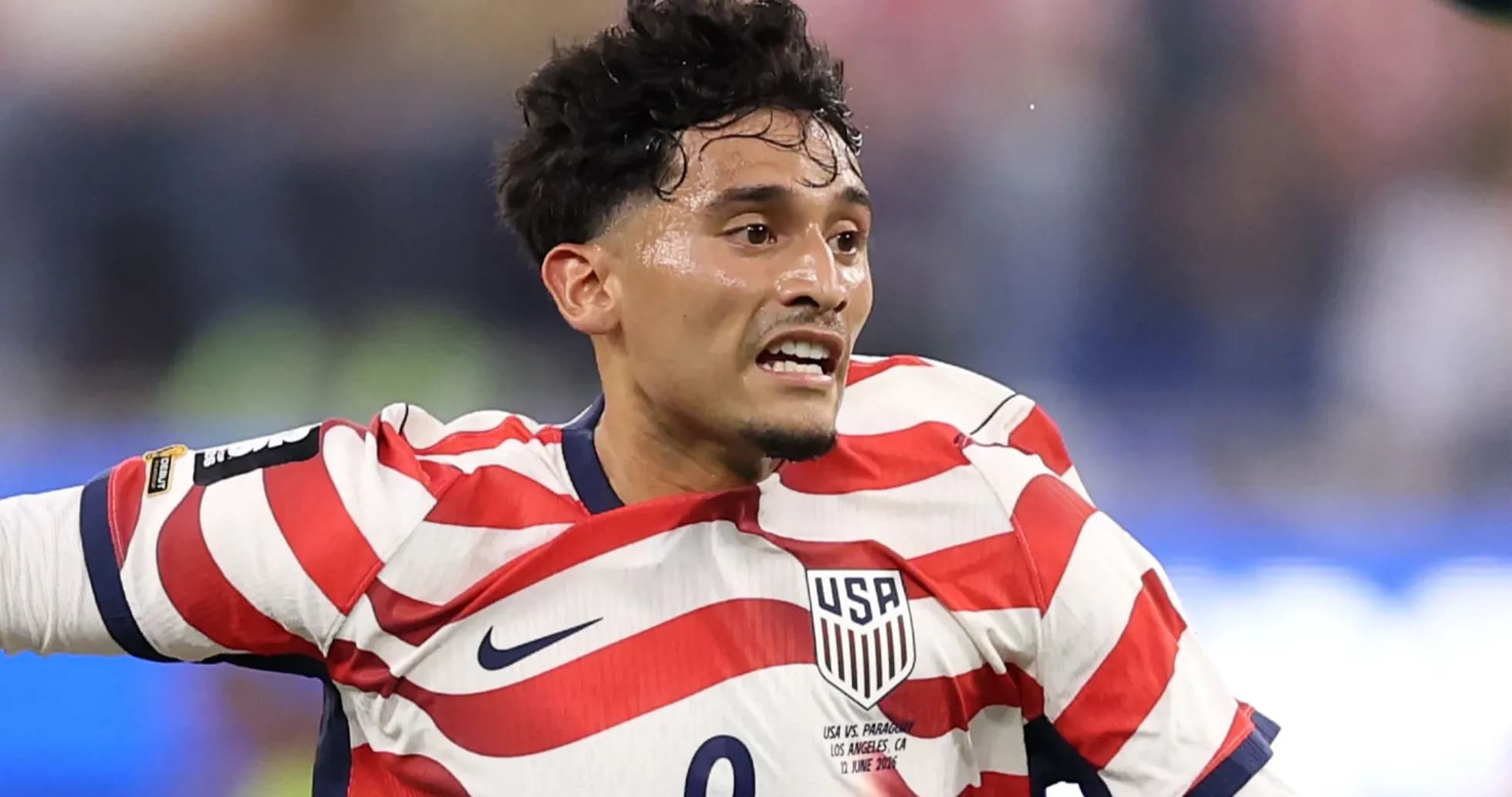 Jugador de Estados Unidos en acción durante partido Jugador de Estados Unidos en acción durante partido