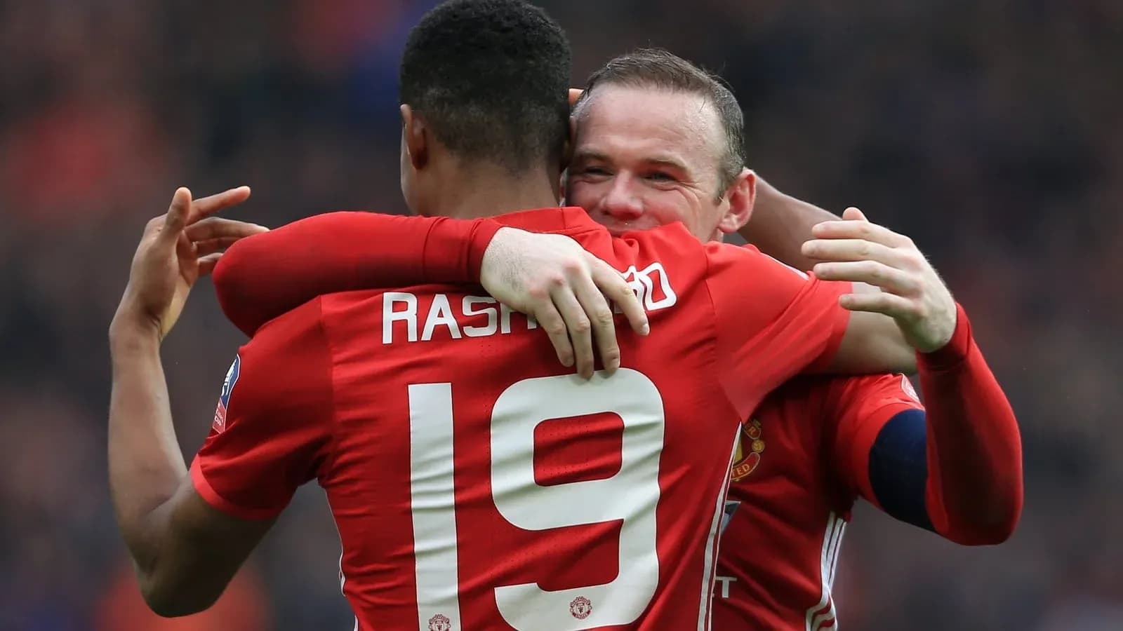 Jugadores de Manchester United celebrando un gol Jugadores de Manchester United celebrando un gol