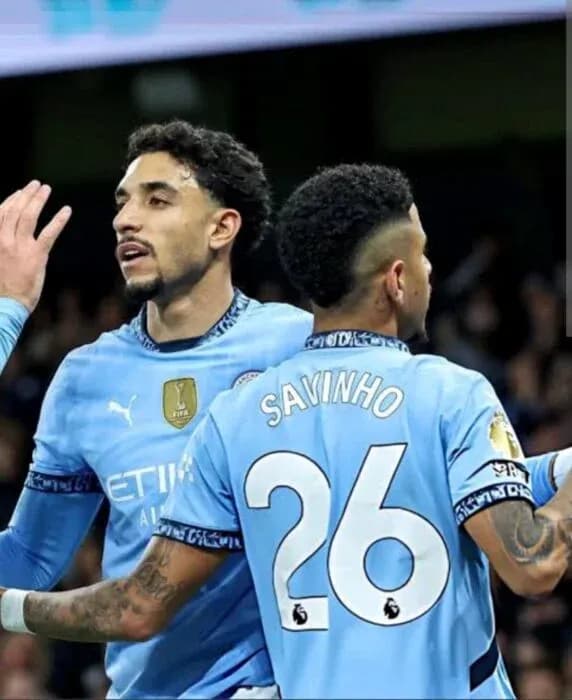 Jugadores de Manchester City celebrando un gol Jugadores de Manchester City celebrando un gol