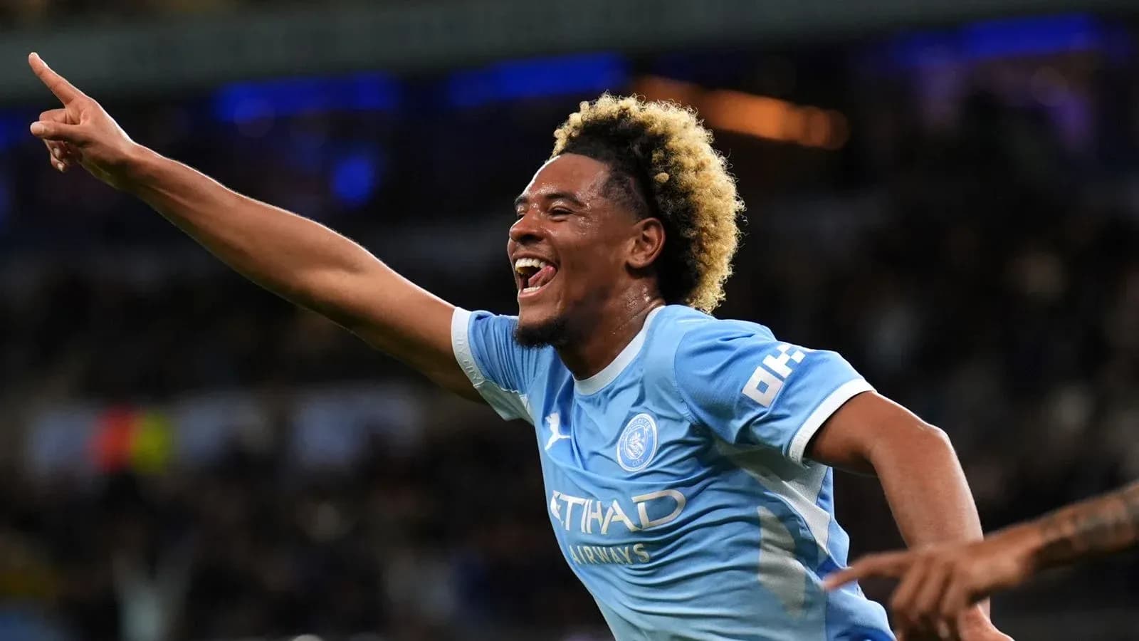Jugador de Manchester City celebrando un gol Jugador de Manchester City celebrando un gol