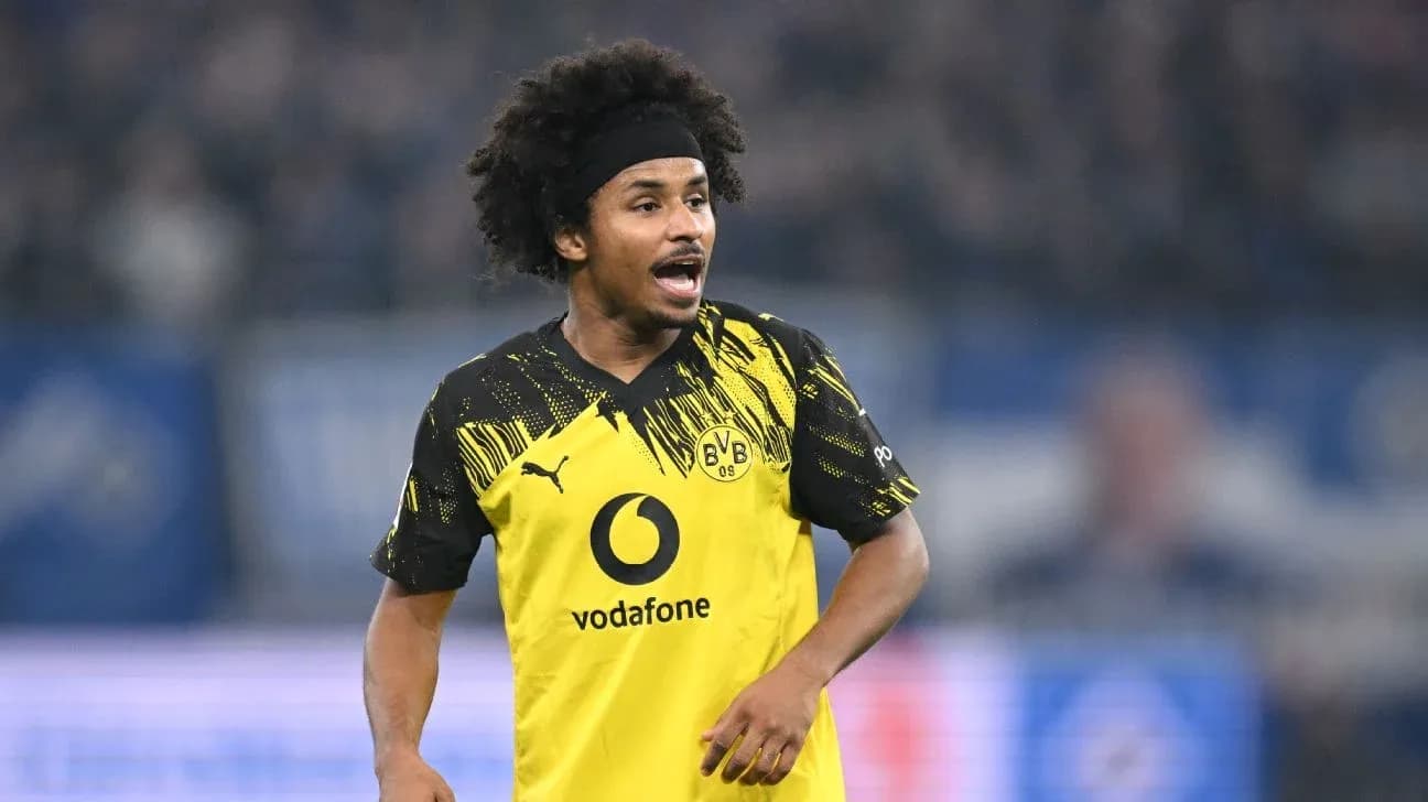 Jugador de Borussia Dortmund en acción durante el partido Jugador de Borussia Dortmund en acción durante el partido