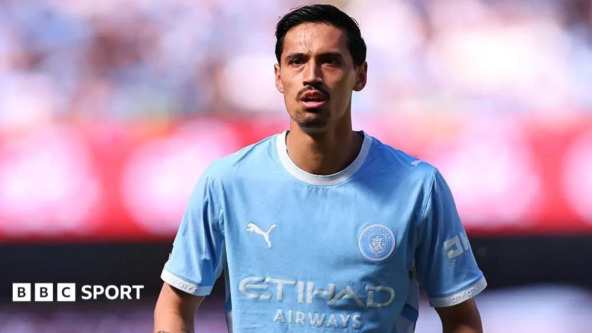 Jugador de Manchester City en el campo Jugador de Manchester City en el campo