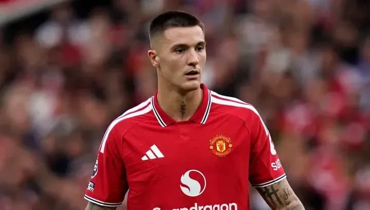 Jugador de Manchester United en el campo de juego Jugador de Manchester United en el campo de juego