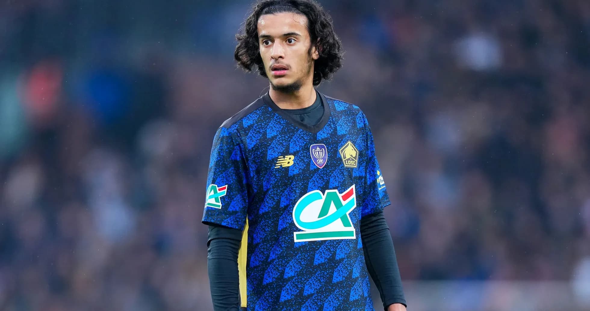 Jugador de Lille en acción durante el partido Jugador de Lille en acción durante el partido
