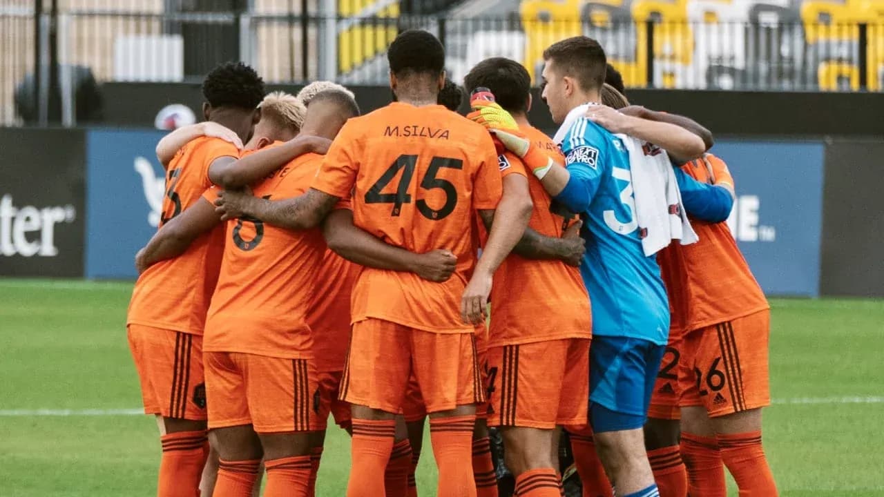Equipo de Houston Dynamo II en círculo Equipo de Houston Dynamo II en círculo