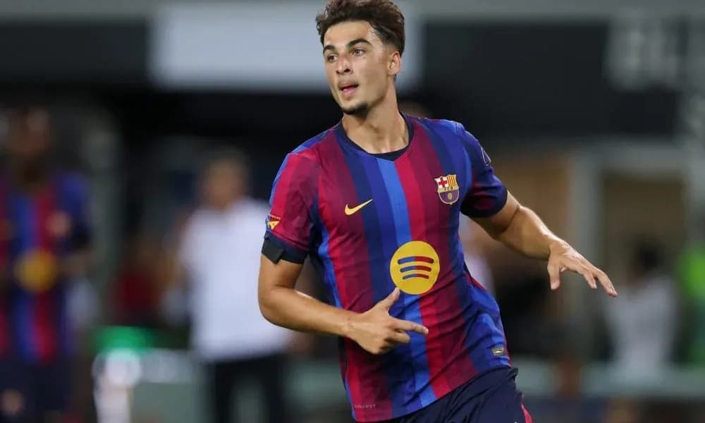 Jugador de Barcelona corriendo durante un partido Jugador de Barcelona corriendo durante un partido