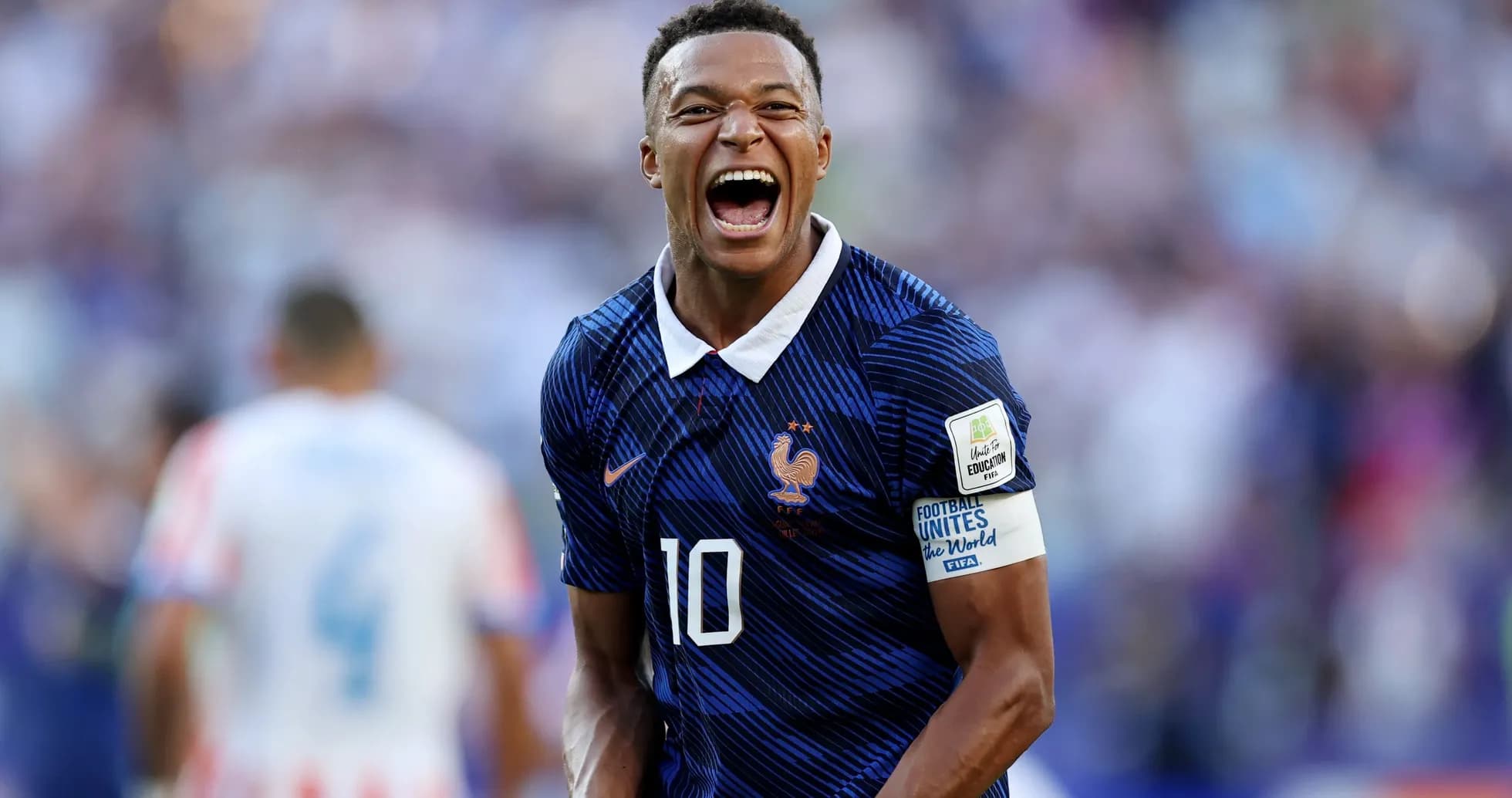 Jugador de Francia celebrando un gol durante partido Jugador de Francia celebrando un gol durante partido