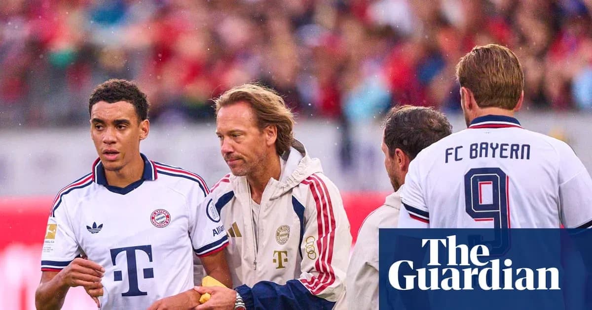 Jugador de Bayern siendo atendido por el personal médico Jugador de Bayern siendo atendido por el personal médico