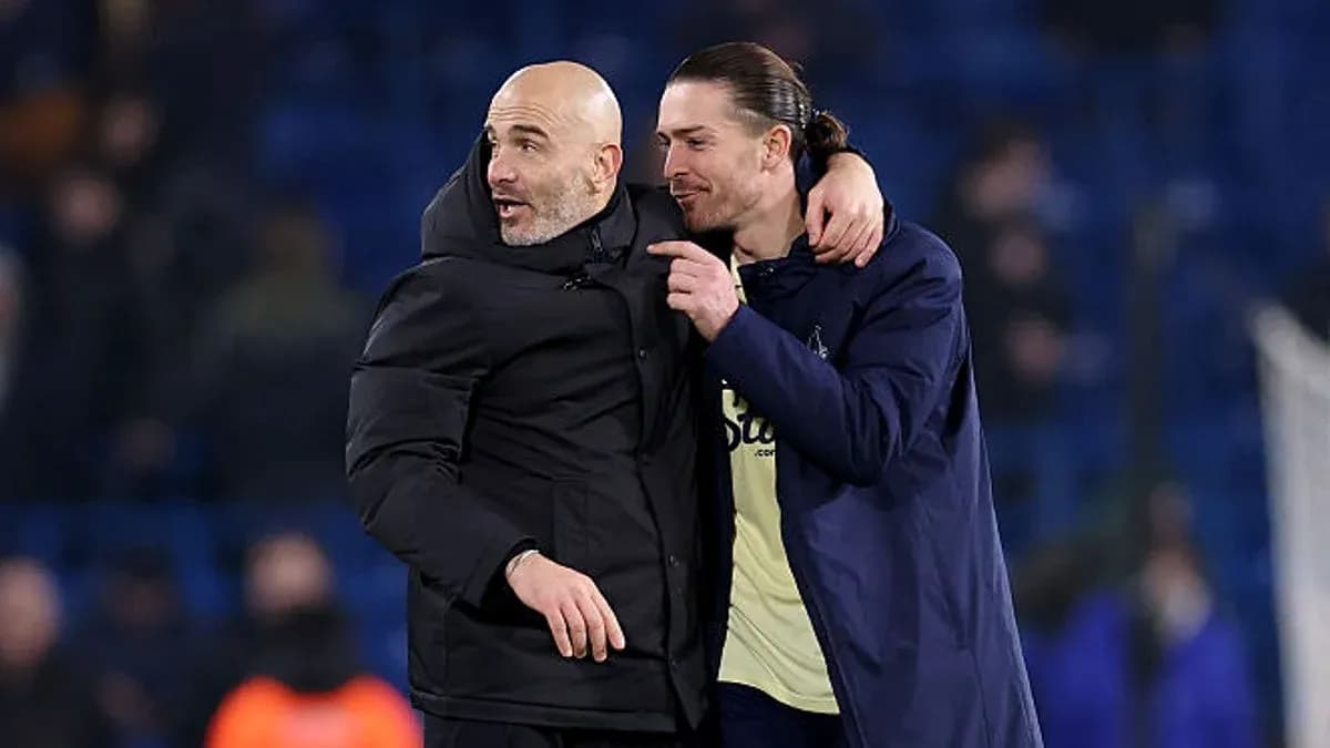 Entrenador y jugador celebrando tras el partido Entrenador y jugador celebrando tras el partido