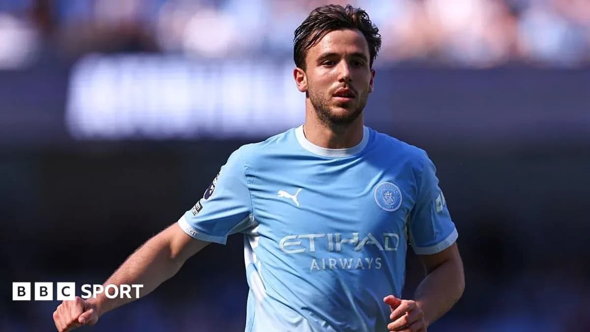 Jugador de Manchester City en acción durante el partido Jugador de Manchester City en acción durante el partido